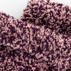 Close-up view of the ultra-soft feather yarn fabric and smooth toe seam design