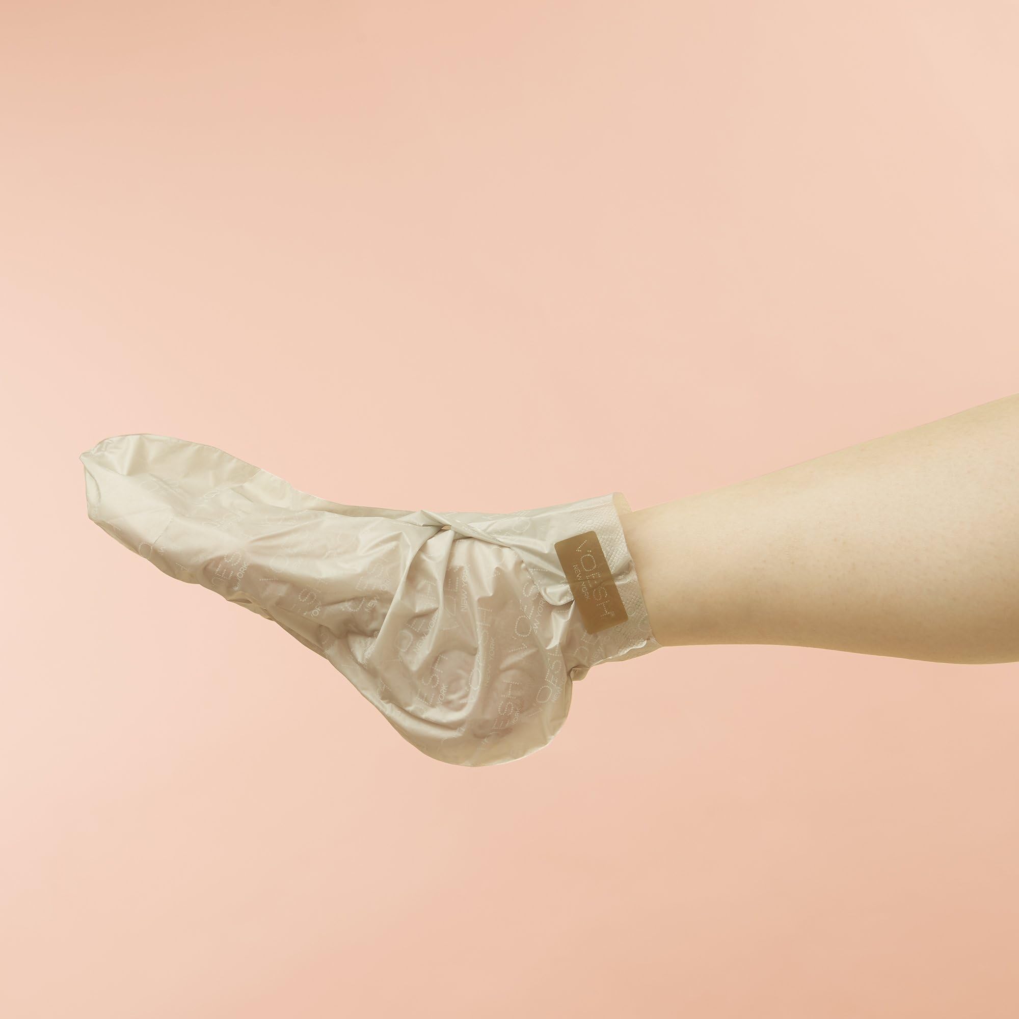 Voesh moisturizing collagen socks being worn on feet