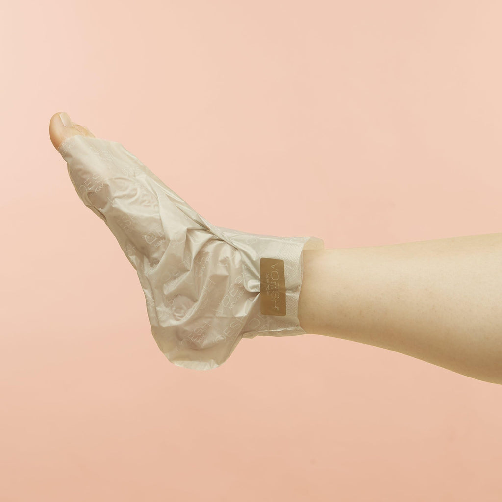 Voesh moisturizing spa pedicure treatment socks laid out for use