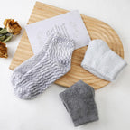 Complete set of Tarpop 3 pairs gray aloe spa socks folded
