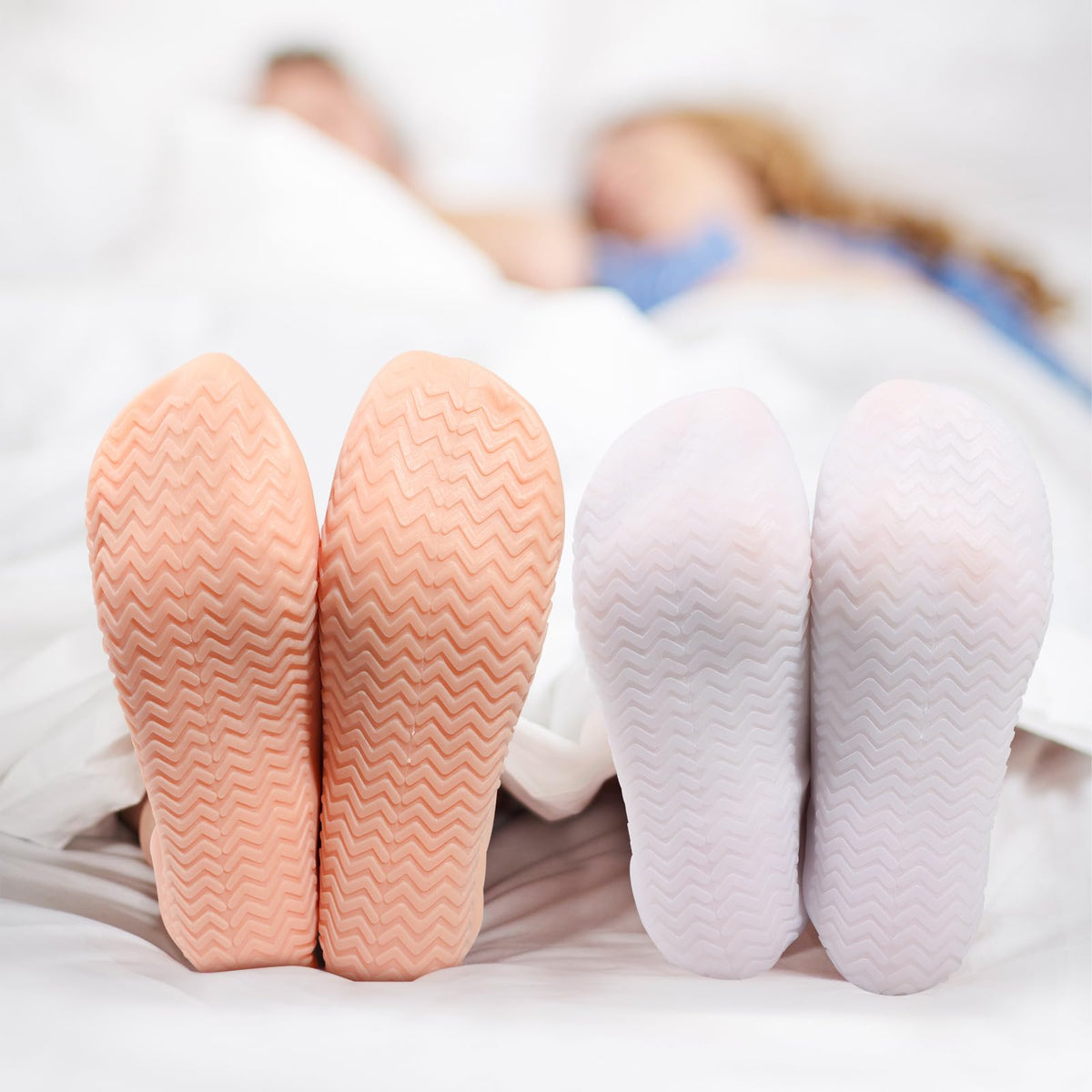 Demonstration of applying foot cream before slipping on the hydrating gel socks