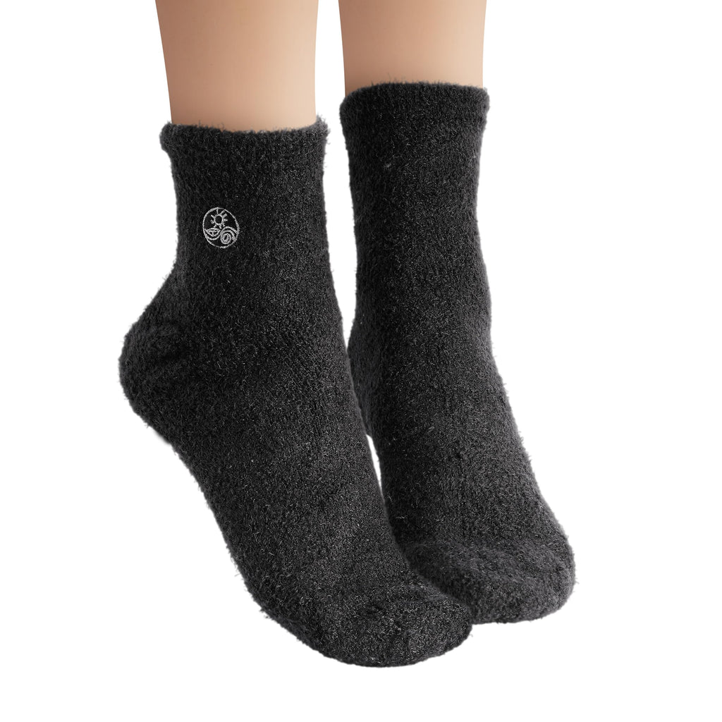 Earth Therapeutics cozy foot care socks lifestyle view