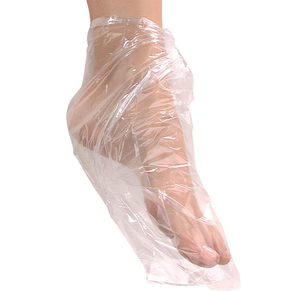 Clear plastic ForPro Cozies paraffin wax liner being applied over a hand for intensive salon moisturizing treatment