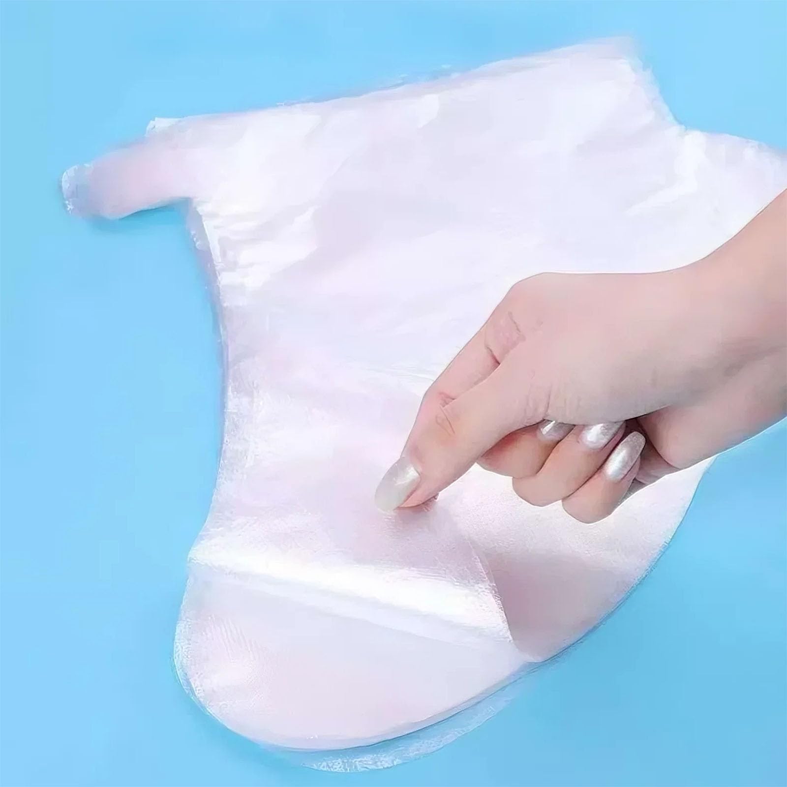 Clear plastic paraffin wax bath liners with ankle stickers attached