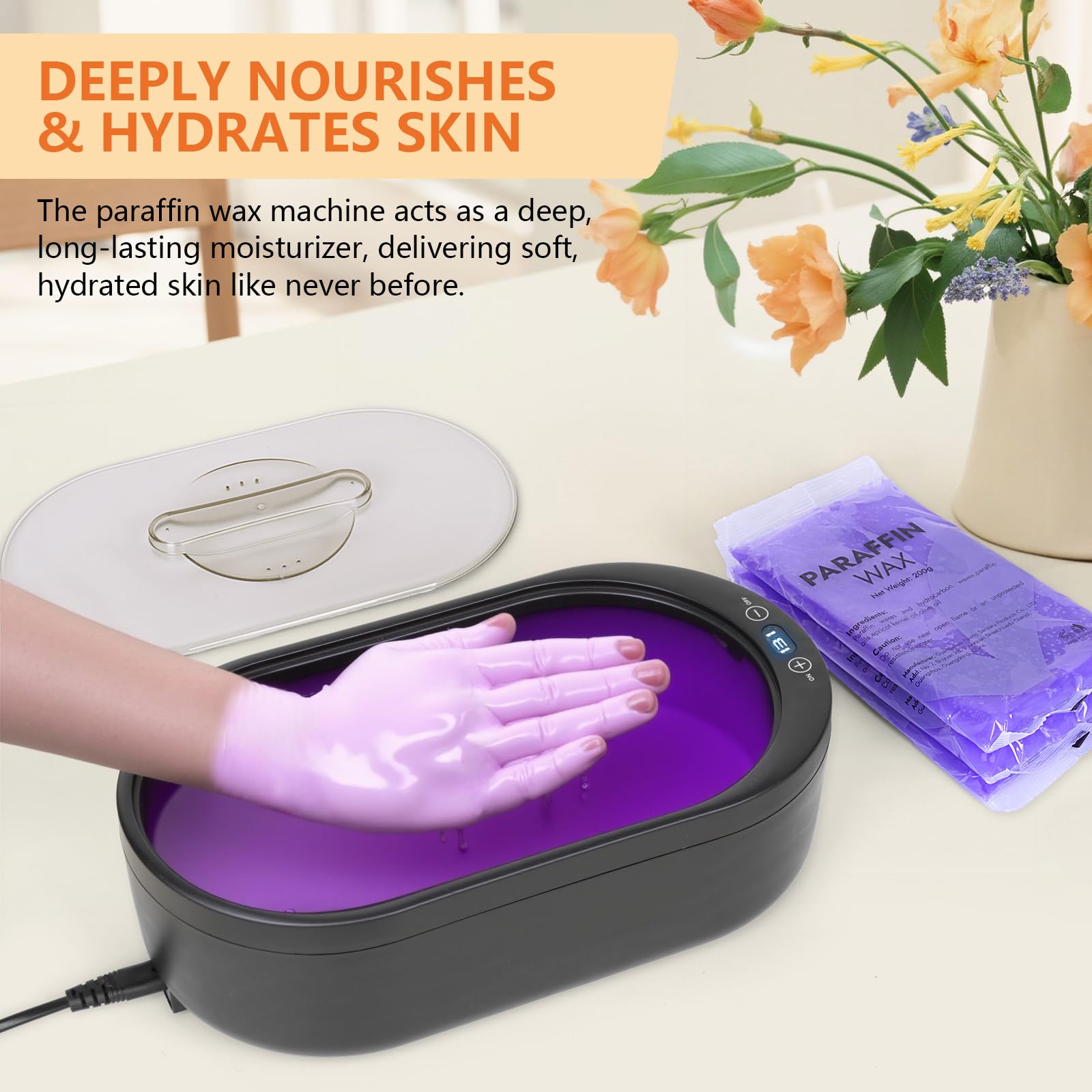 Black paraffin wax warmer with open lid showing melted wax
