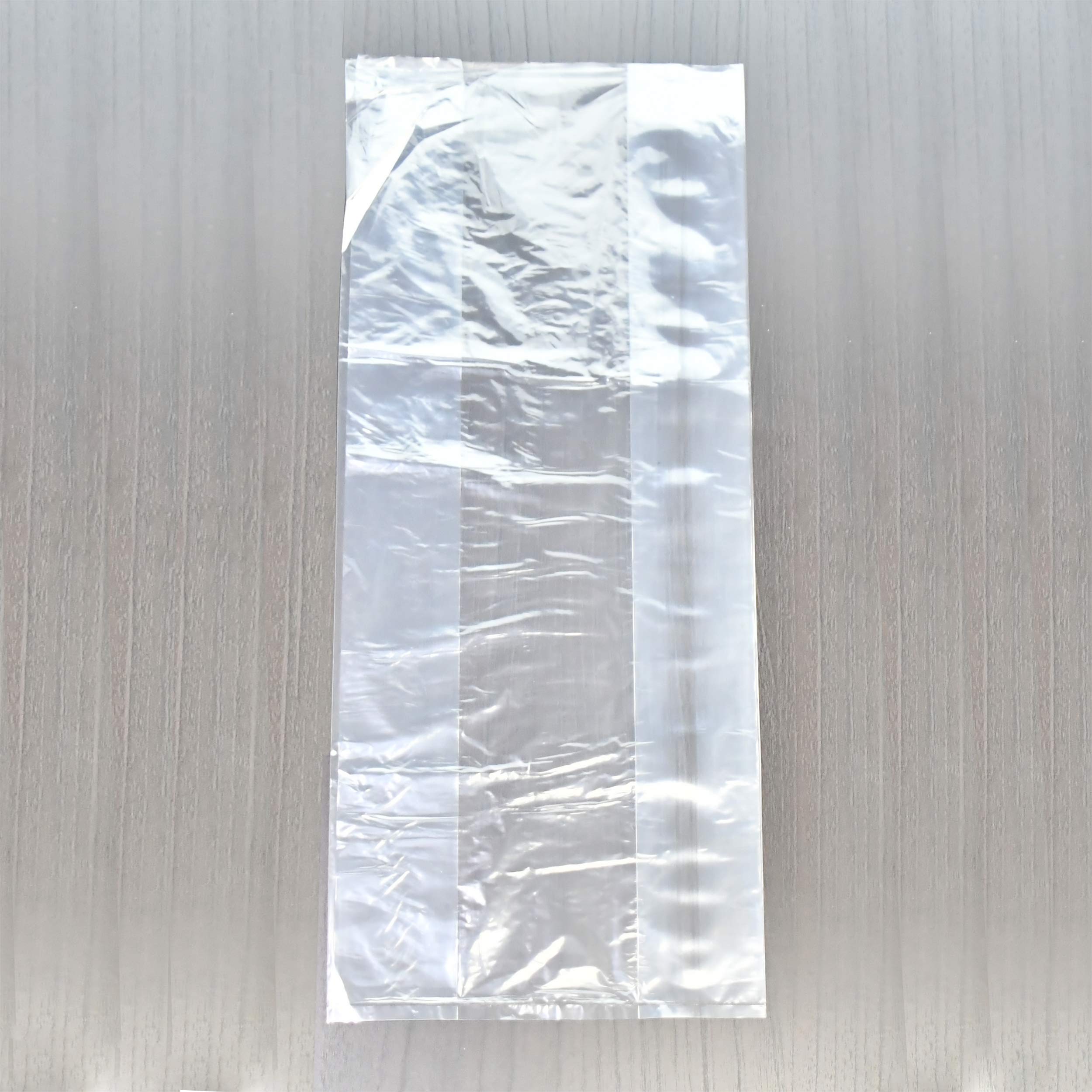 One size fits all transparent wax protectors showing the easy to separate opening design.