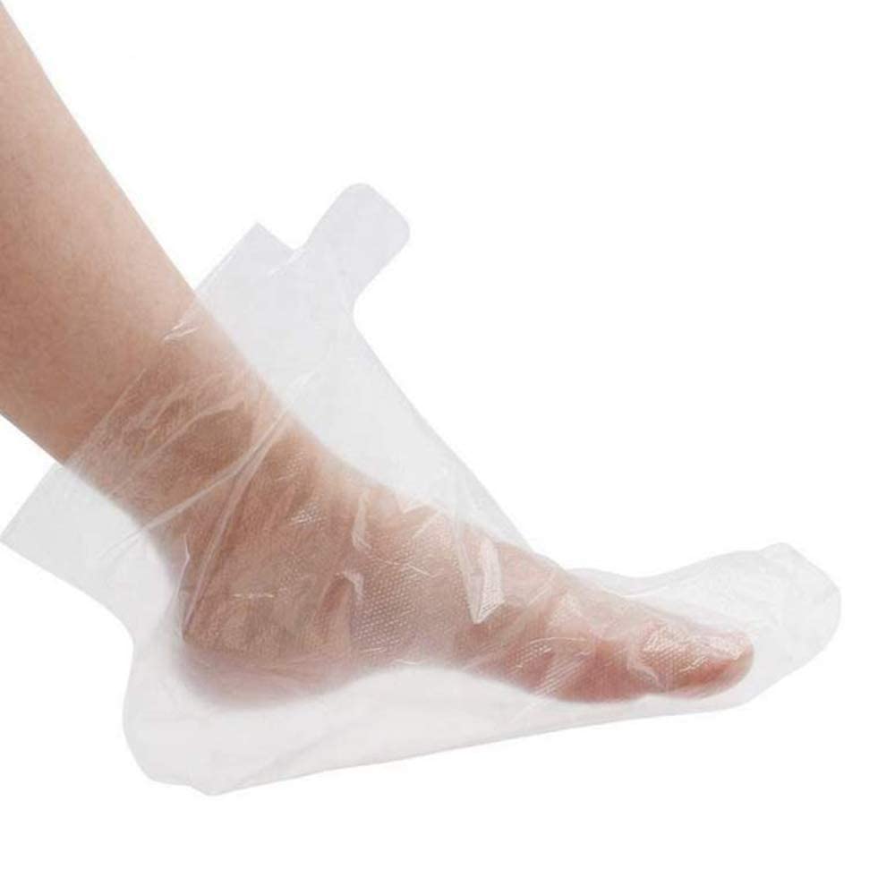 Disposable plastic foot covers used for thermal hot wax spa therapy.