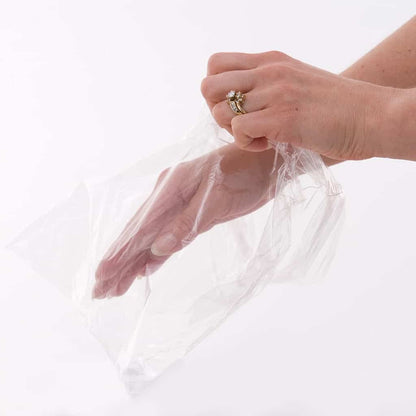 Foot insertion into large clear plastic liner for deep hydration therapy