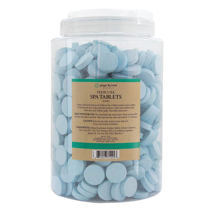 Ginger Lily Farms natural foot care tablets dissolving in warm water bath