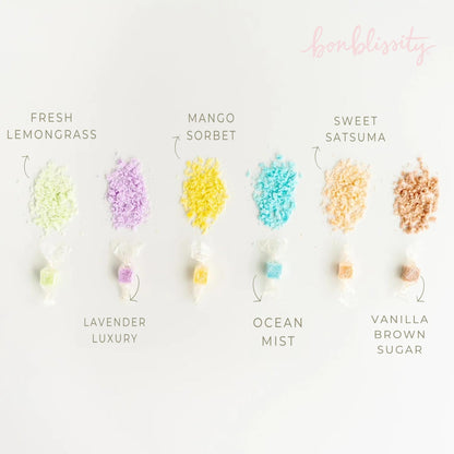 Bonblissity sugar scrub cube being used on hand for exfoliation