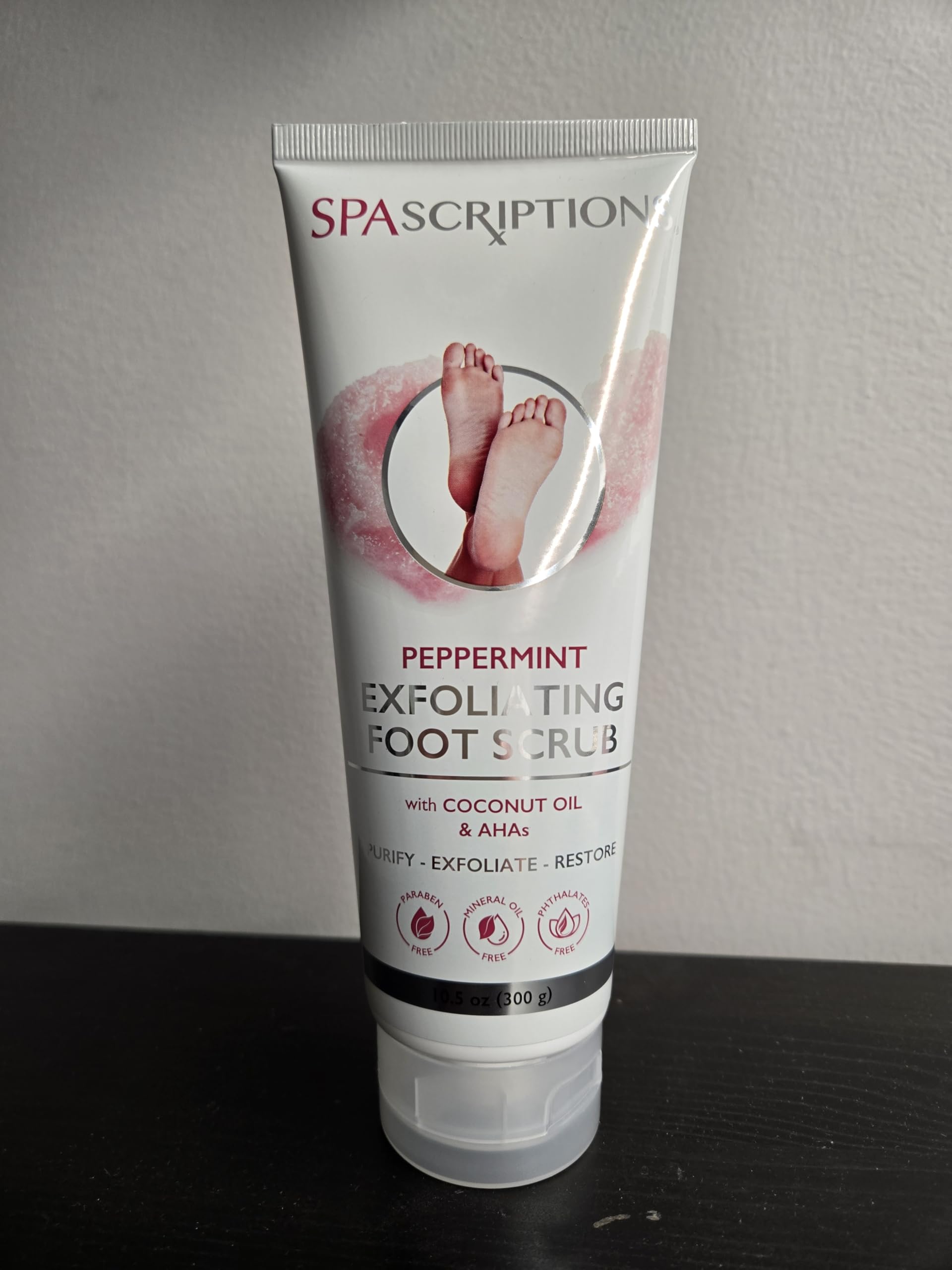SpaScriptions foot scrub packaging showing peppermint and coconut oil ingredients