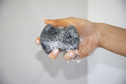 Close up of Spongeables pedi scrub sponge showing the smooth cleansing side