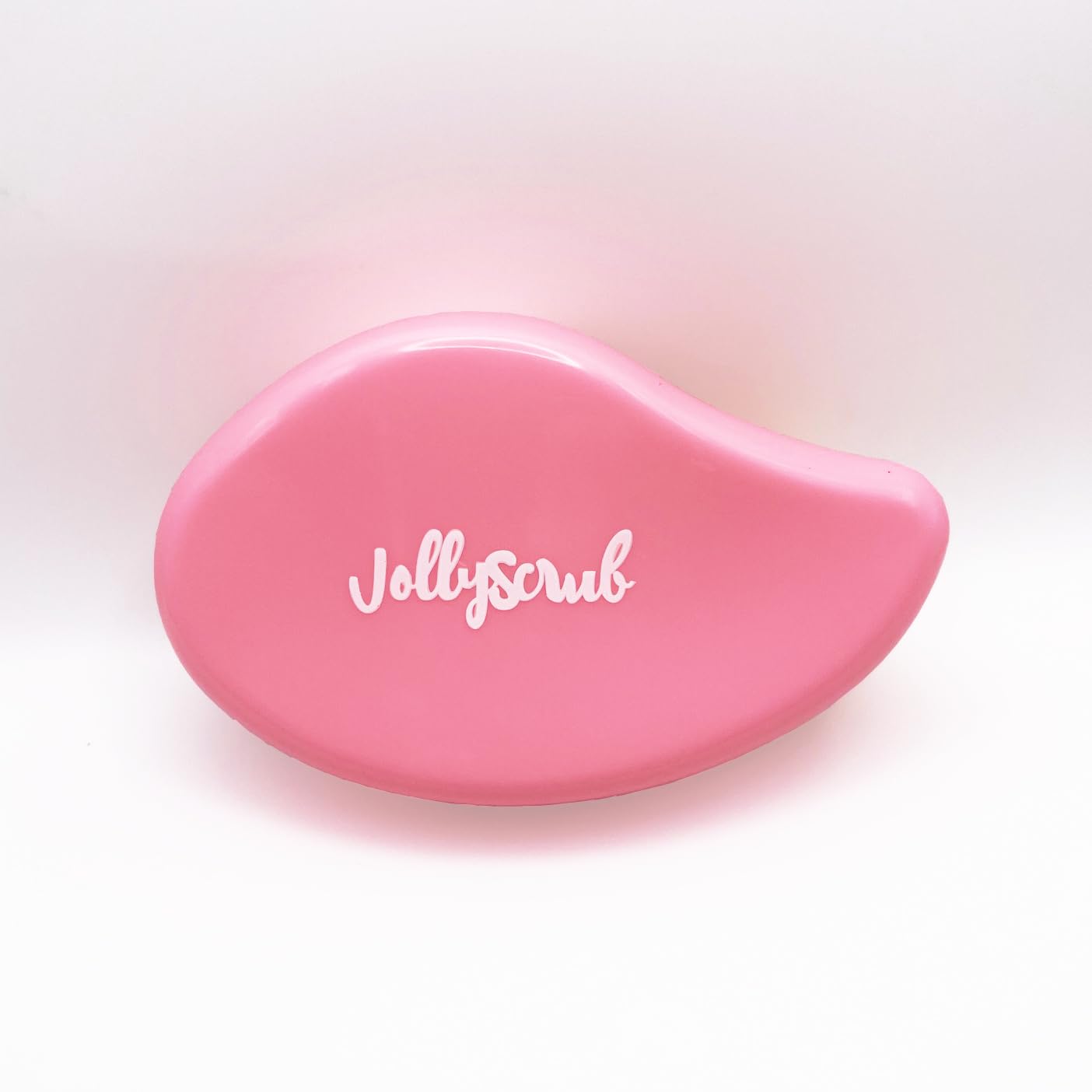 Using nano glass scrubber on dry feet for dead skin removal
