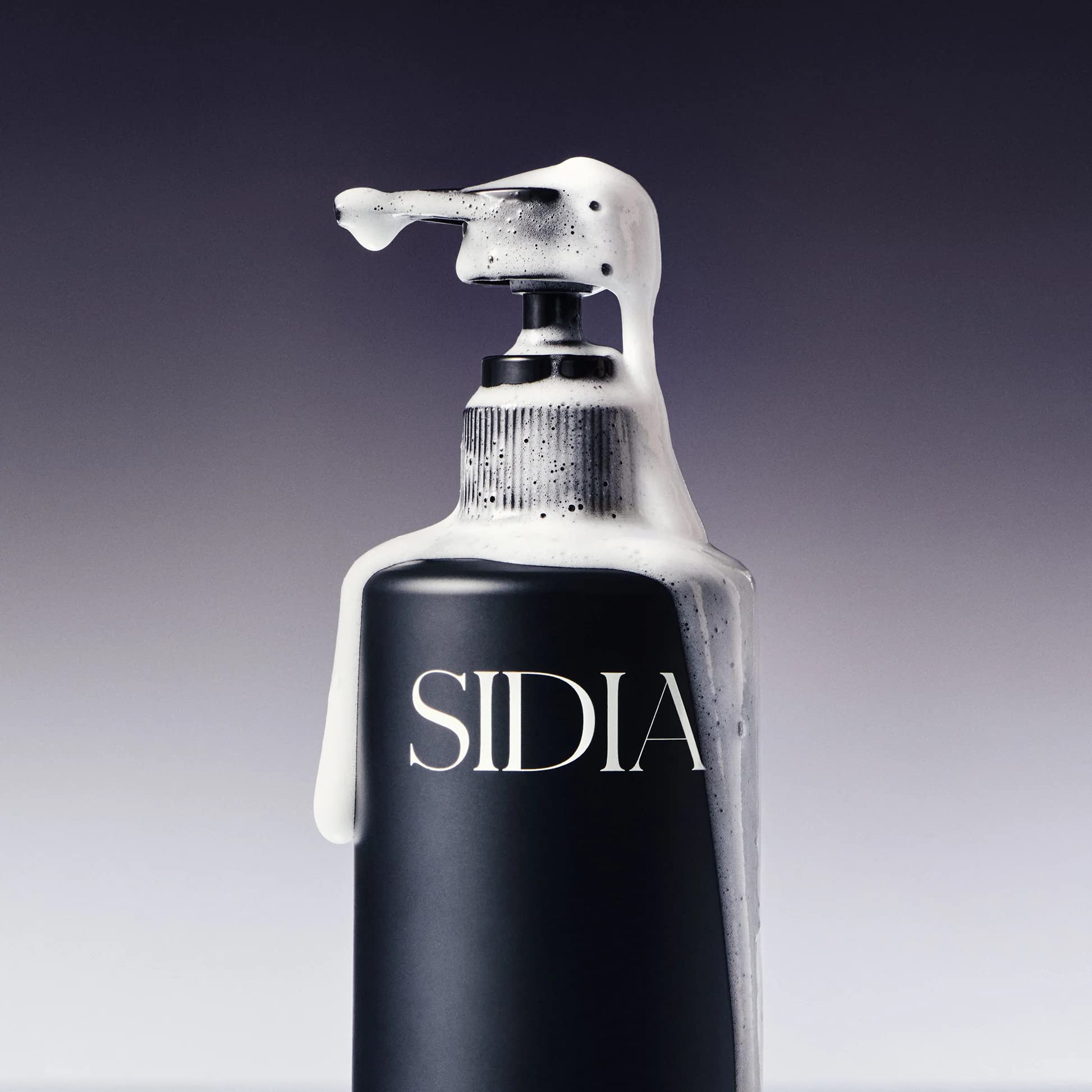 Applying Sidia Soaked Hand Exfoliant to hands