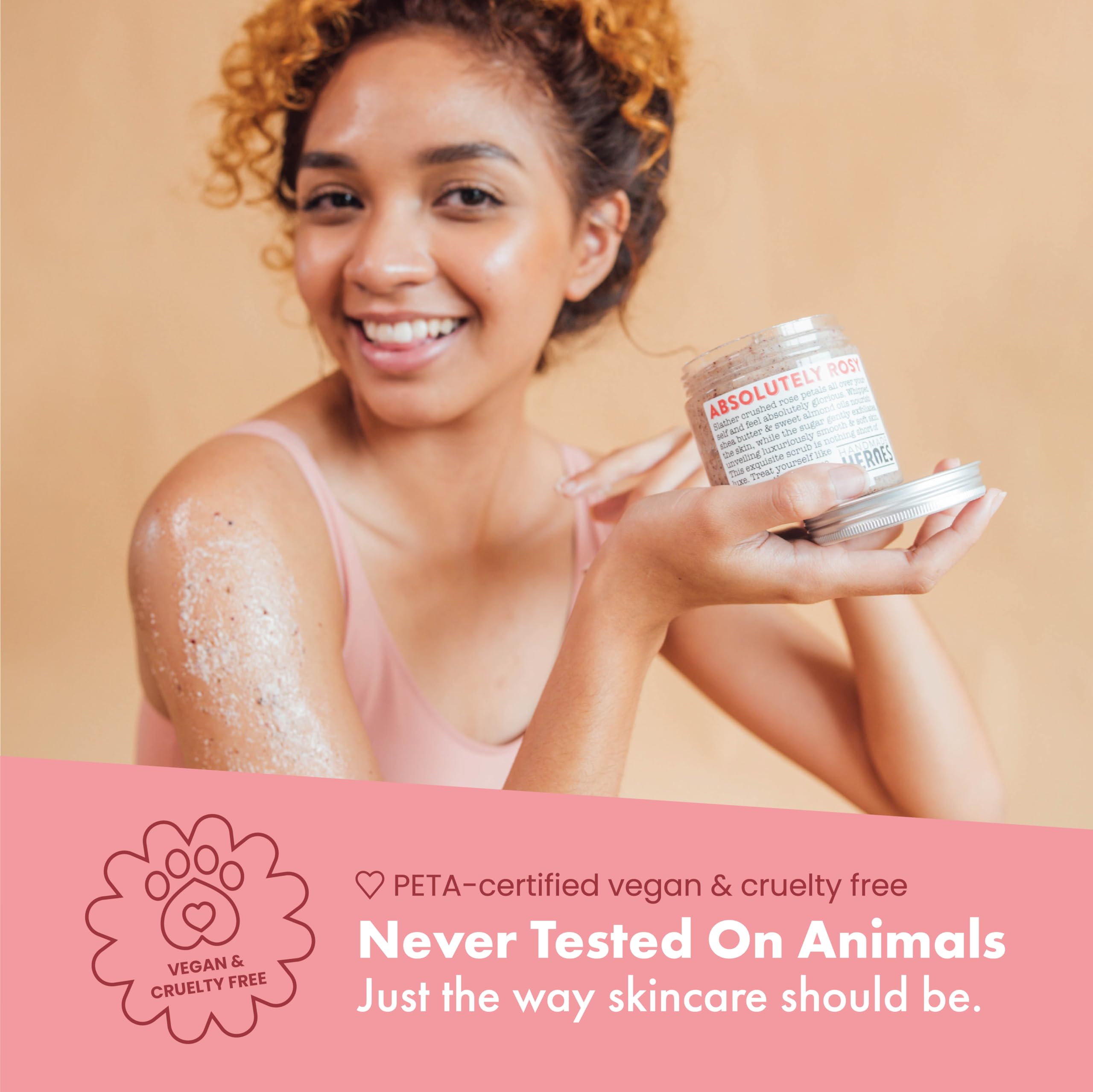 Applying Handmade Heroes rose petal scrub to damp skin