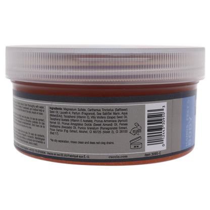 Cuccio extra fine body and pedicure sea salt scrub packaging displaying natural ingredients