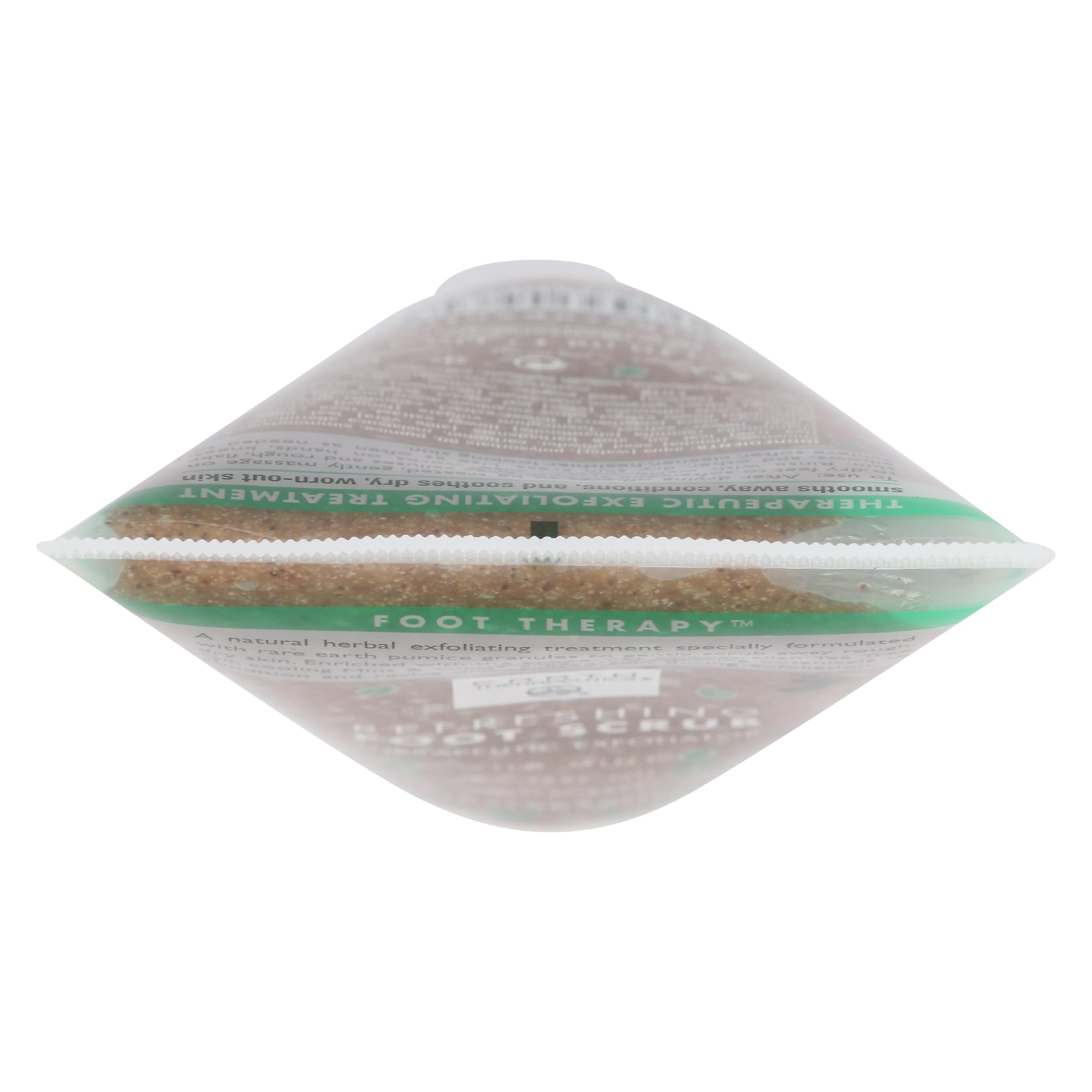 Close up of Earth Therapeutics tube packaging highlighting natural pumice granules