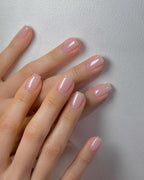 Top-down view of the gel nail polish brush applicator and creamy jelly texture.