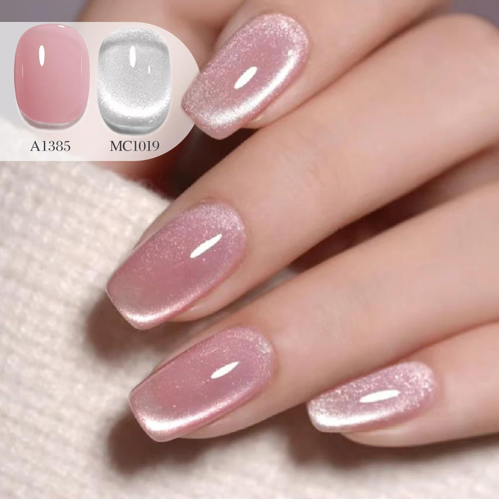 Close up view of magnetic cat eye nail art design on a manicured hand