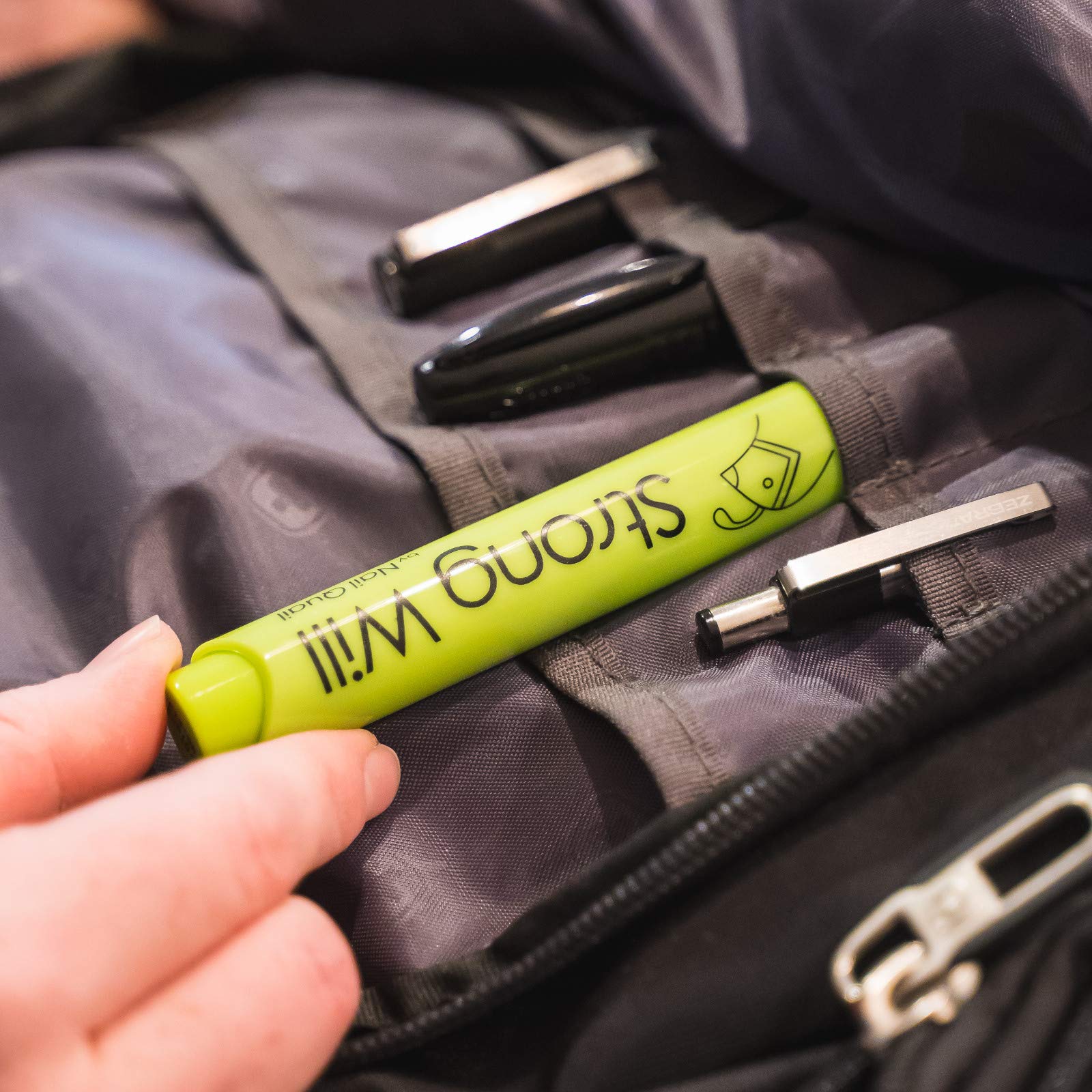 Nail Quail anti nail biting pen size comparison in hand
