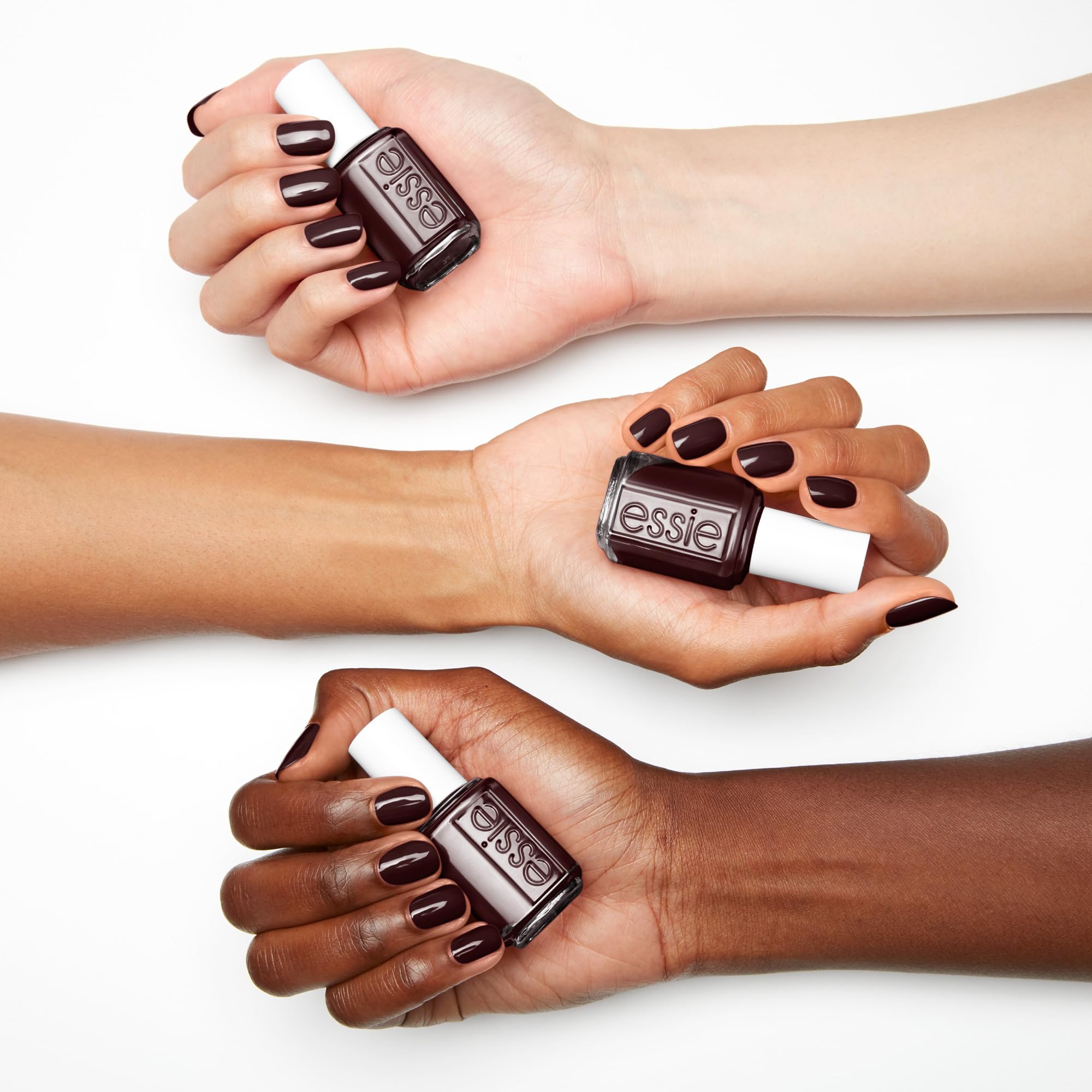 Essie Wicked dark burgundy nail polish swatch on skin