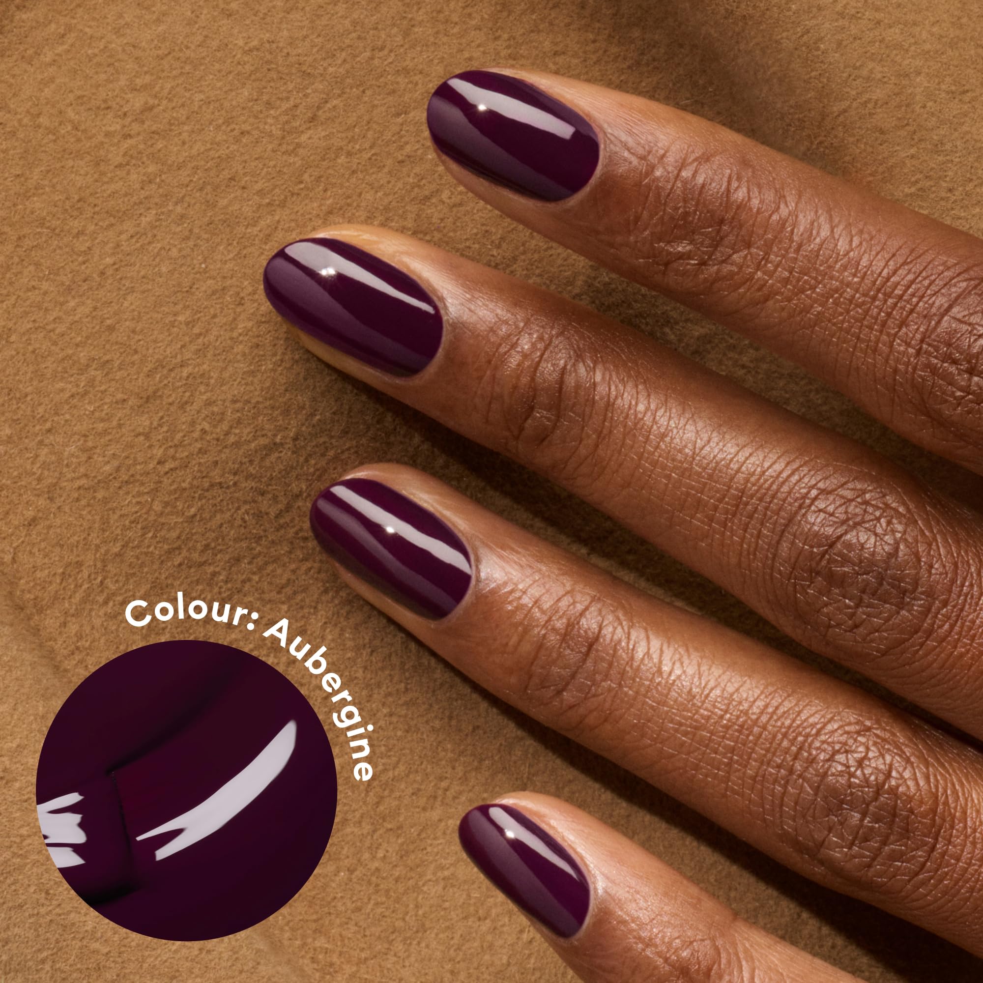 Manucurist Hollyhock blackish red nail polish swatch on nails