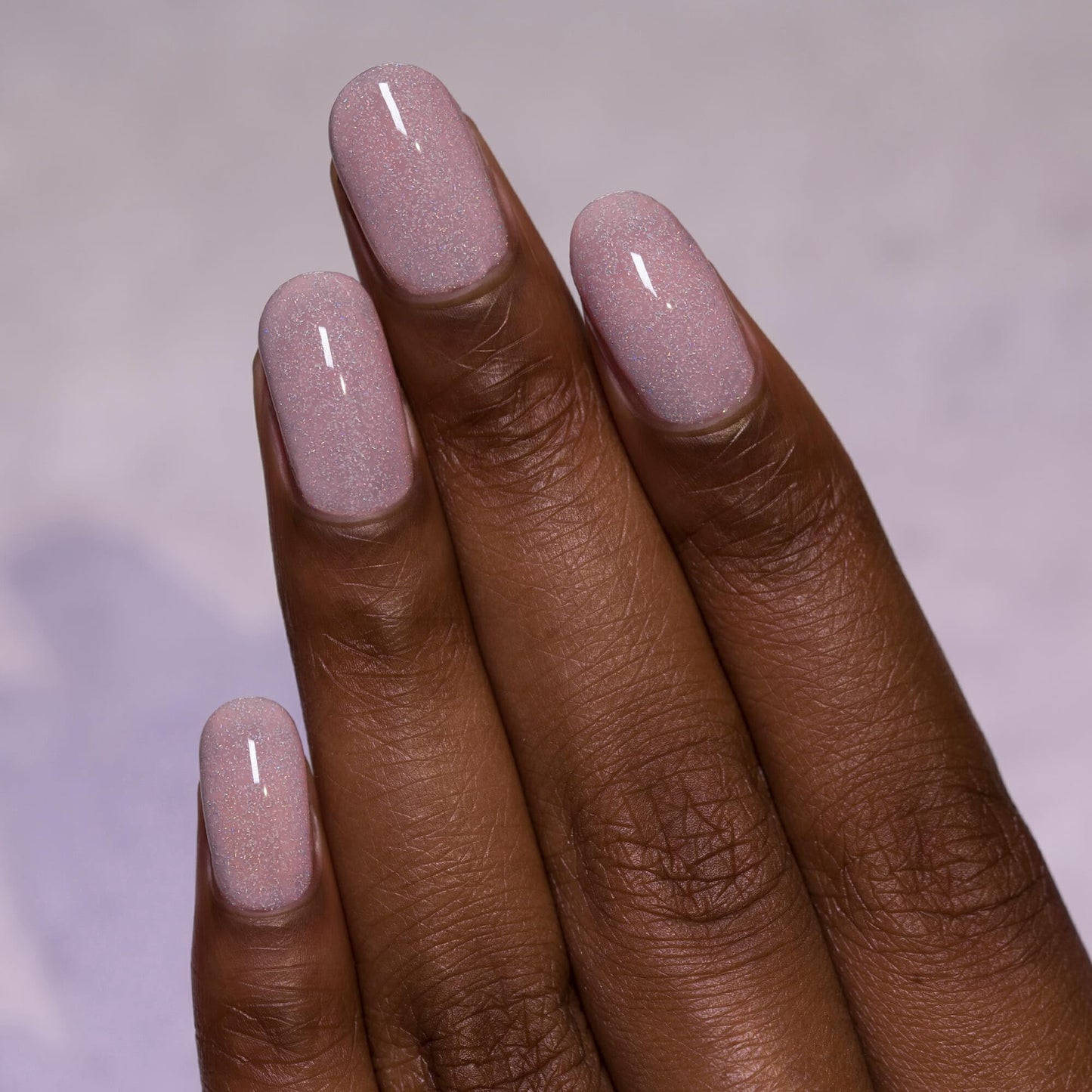 Top down view of ILNP Birthday Suit nail polish bottle