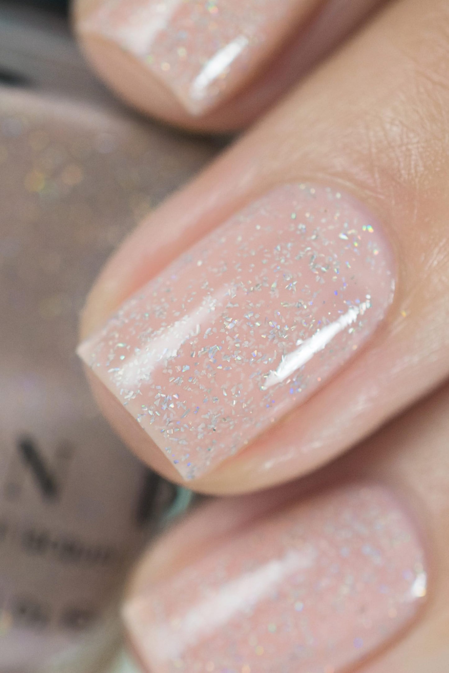Back of ILNP Birthday Suit nail polish bottle with details