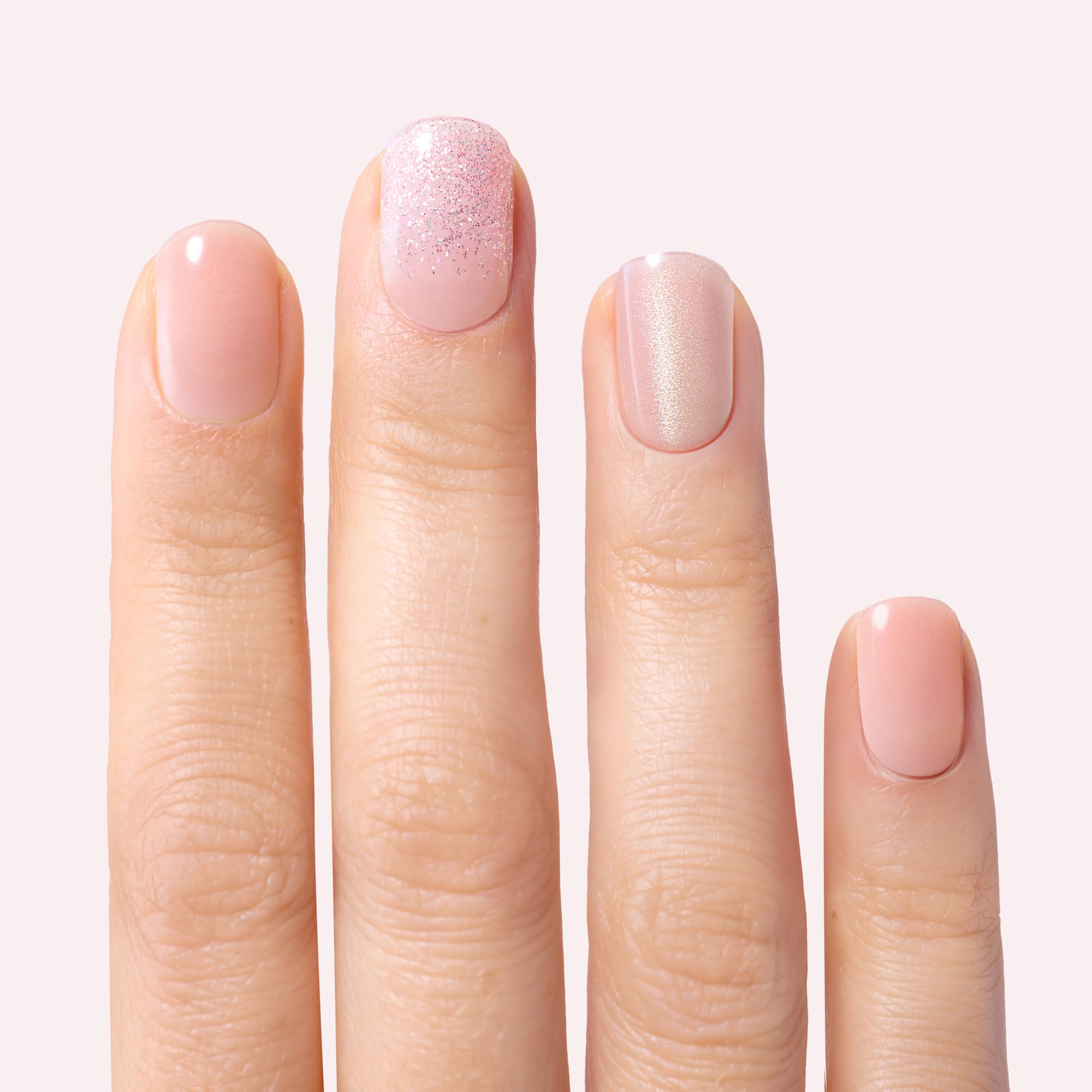Dashing Diva Holiday Romance gel nail strips application close up
