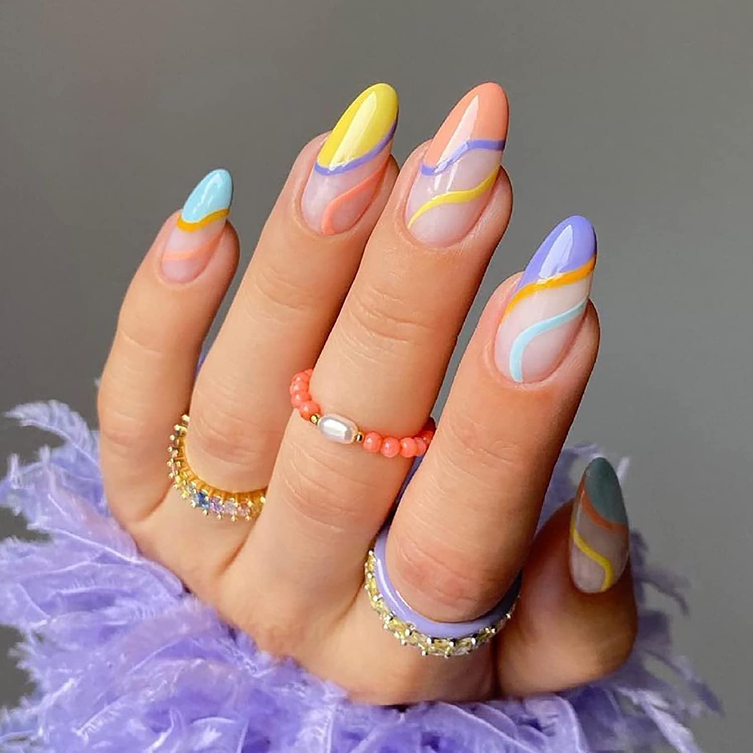 Close up of almond shape artificial nails from the Misssix collection