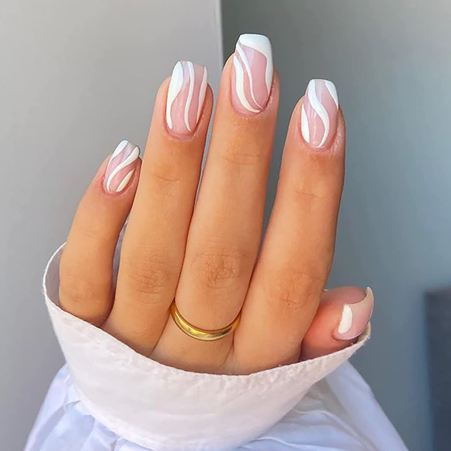Included adhesive tabs and nail file for manicure application