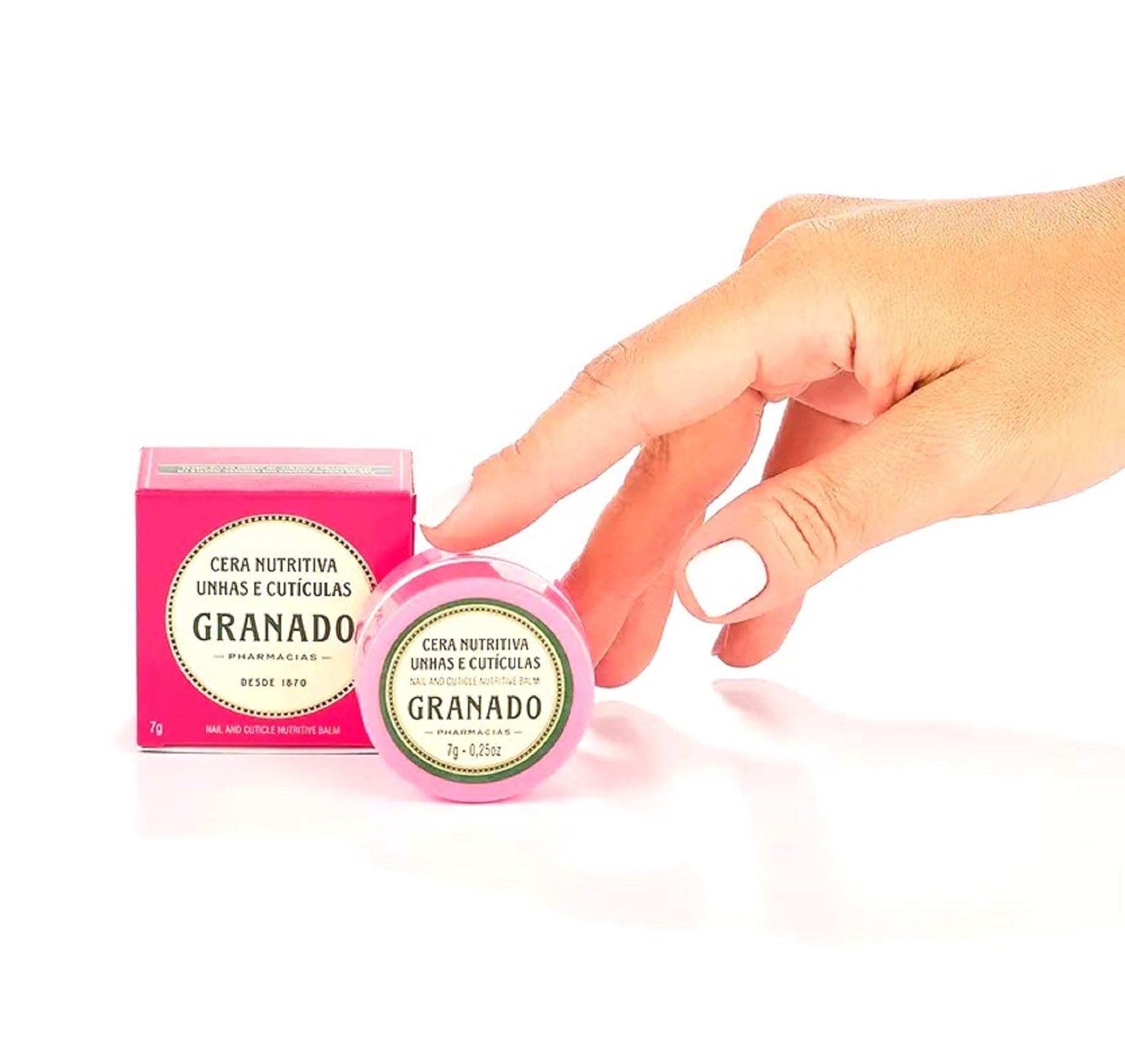 Open tin of Granado Cera Nutritiva cuticle balm showing nourishing wax texture