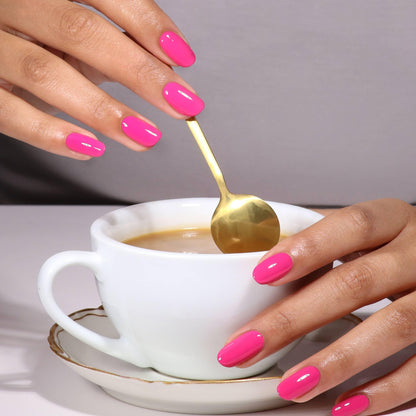 At home salon quality manicure process using UV LED curing lamp with gel top coat