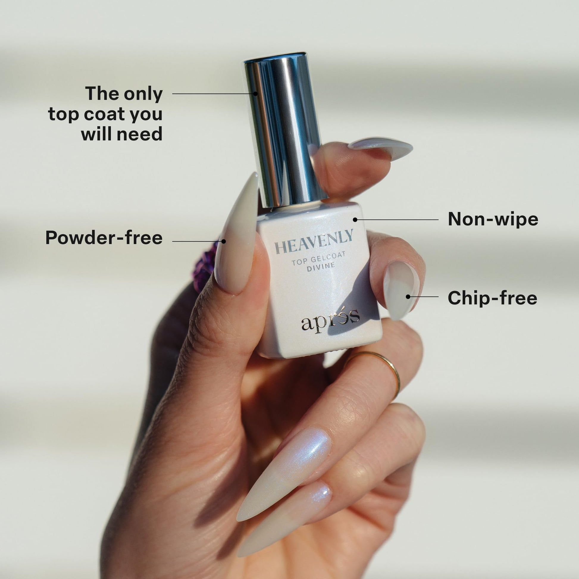 Manicure displaying the celestial blue shift finish of Divine topcoat