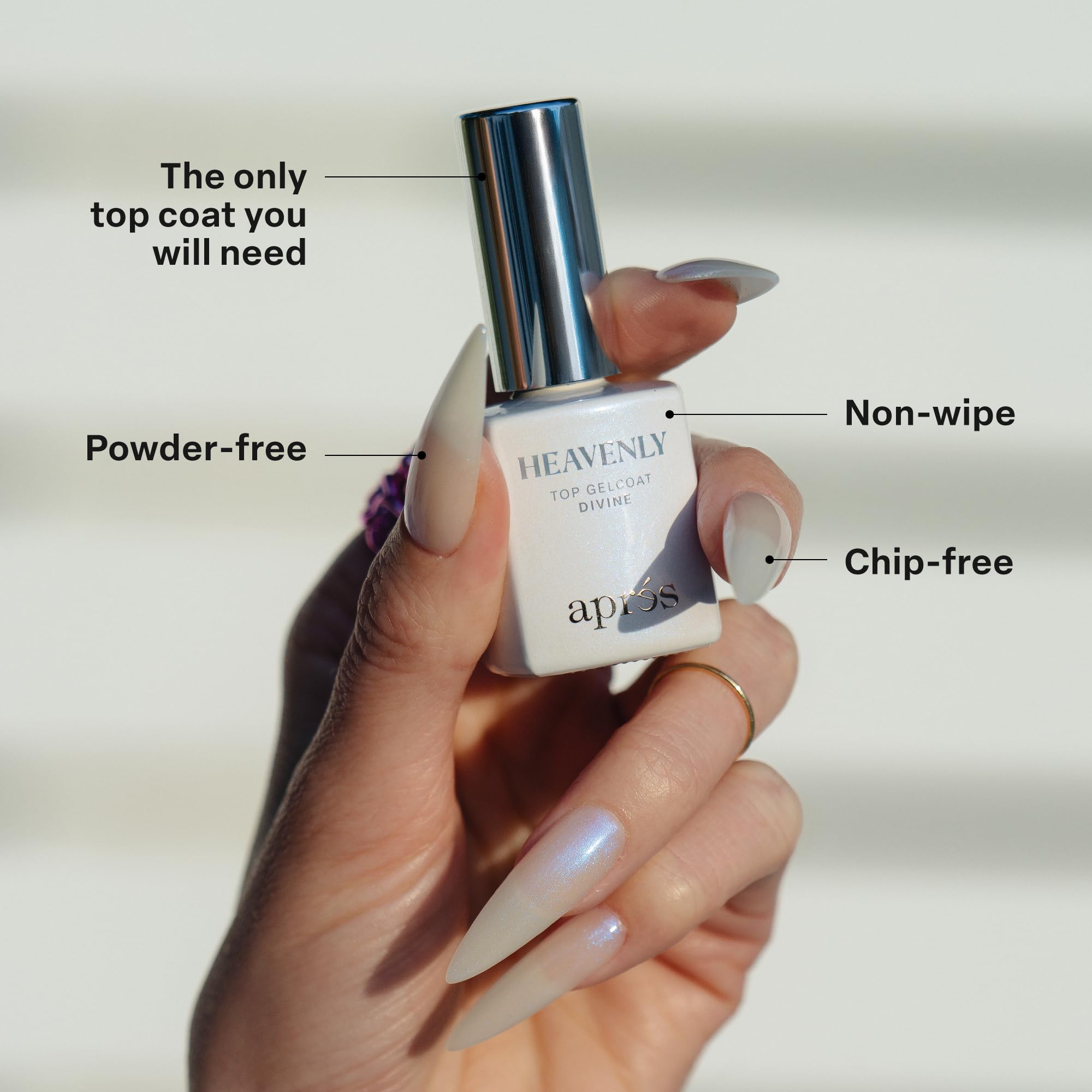 Manicure displaying the celestial blue shift finish of Divine topcoat