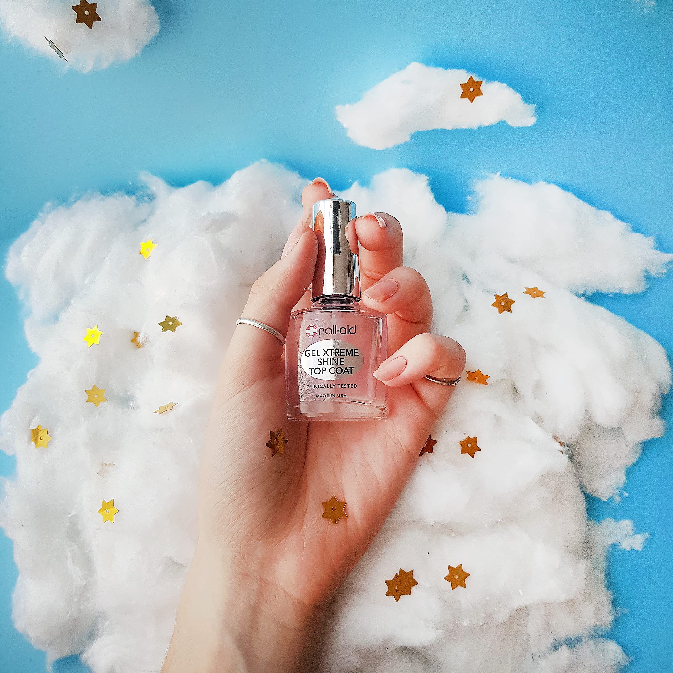 Nail-Aid long wearing chip free top coat bottle on professional background