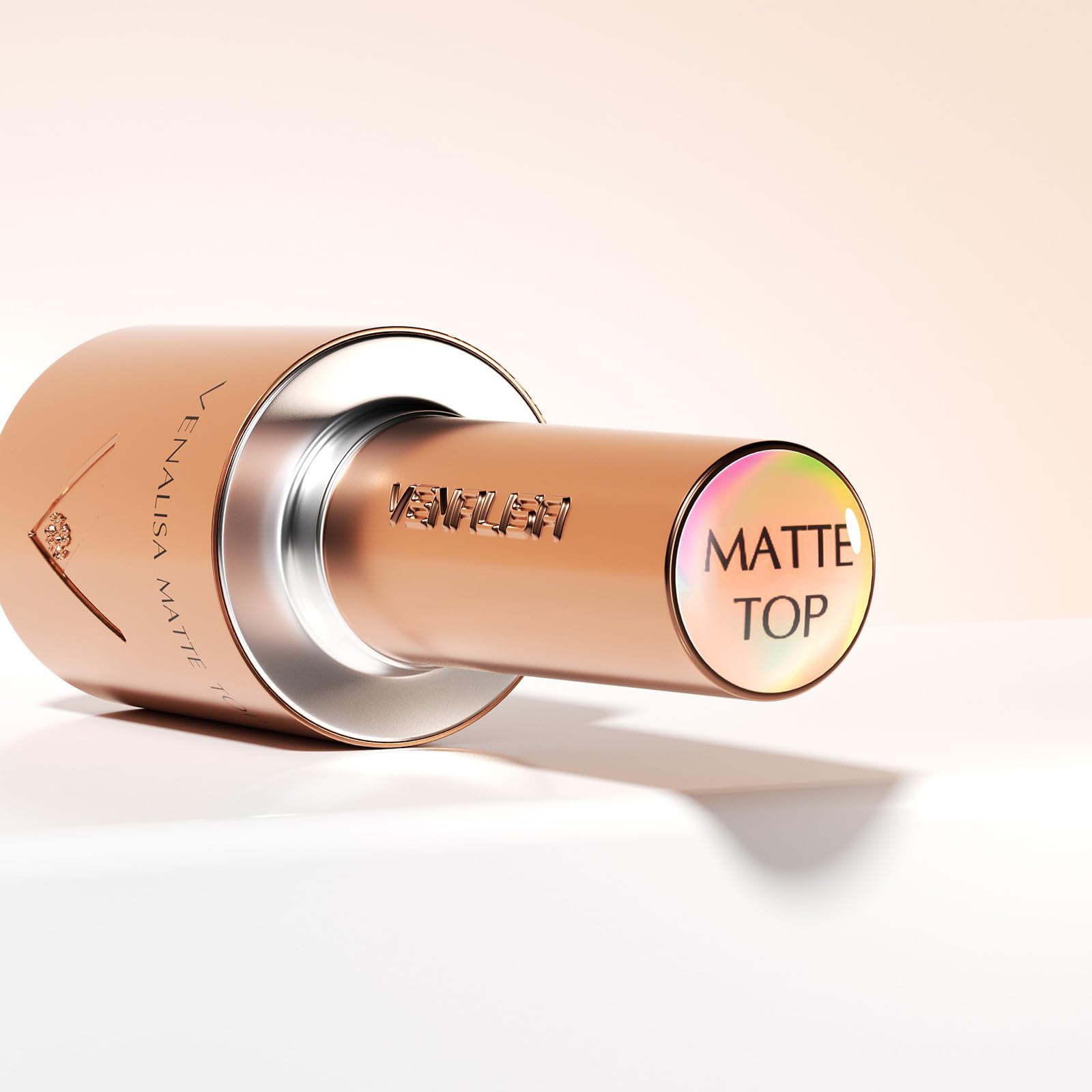Matte top coat bottle next to a professional UV LED salon curing lamp