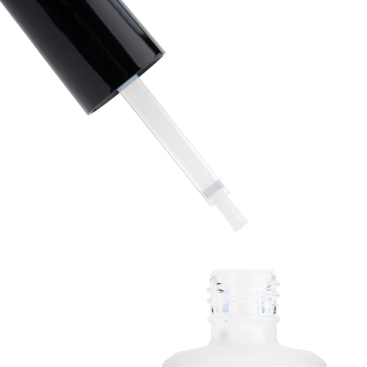 Aprés nail prep liquid bottle cap off displaying the built-in applicator brush