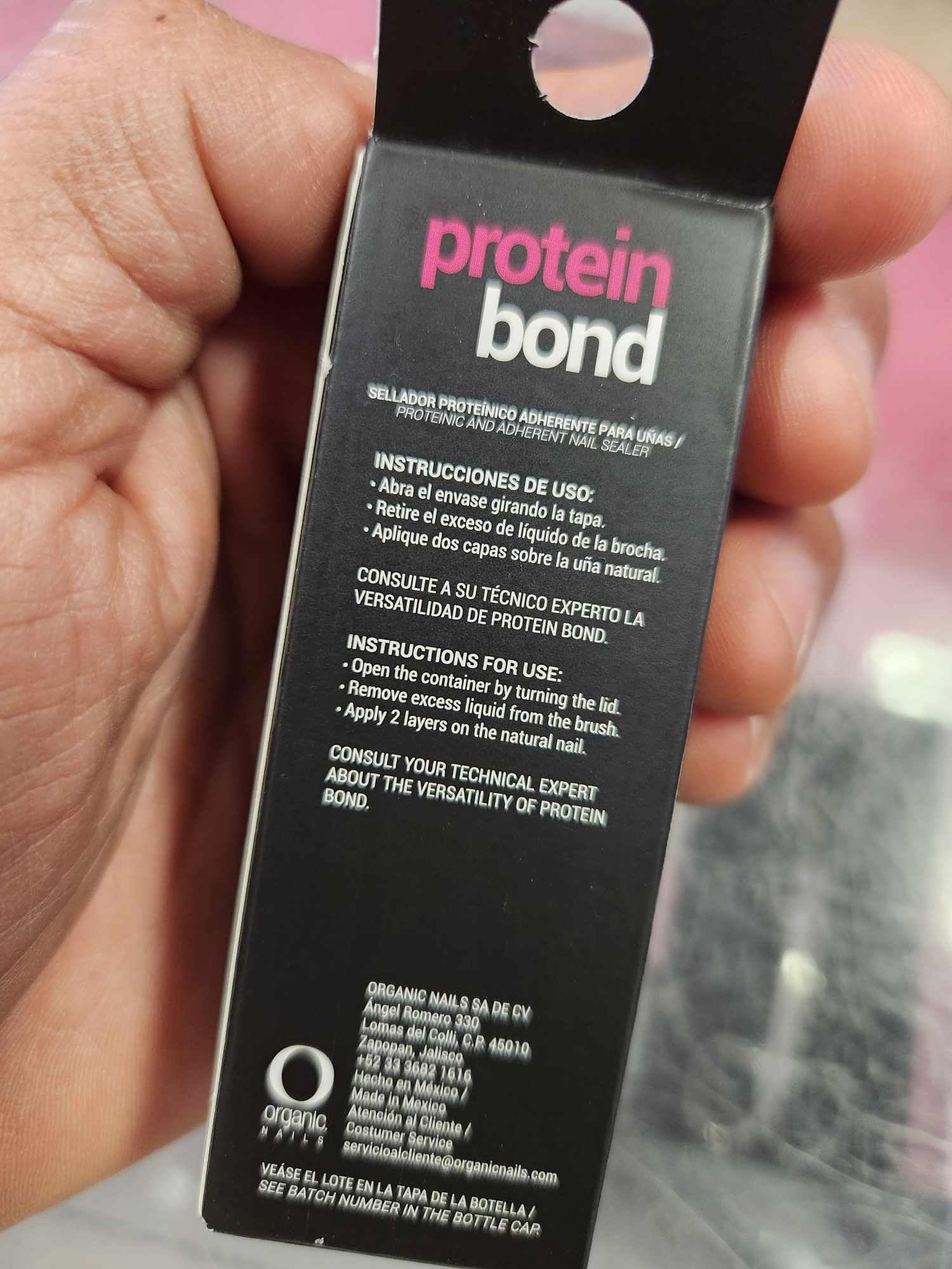 Organic Nails protein sealant showing the convenient applicator brush and bottle design