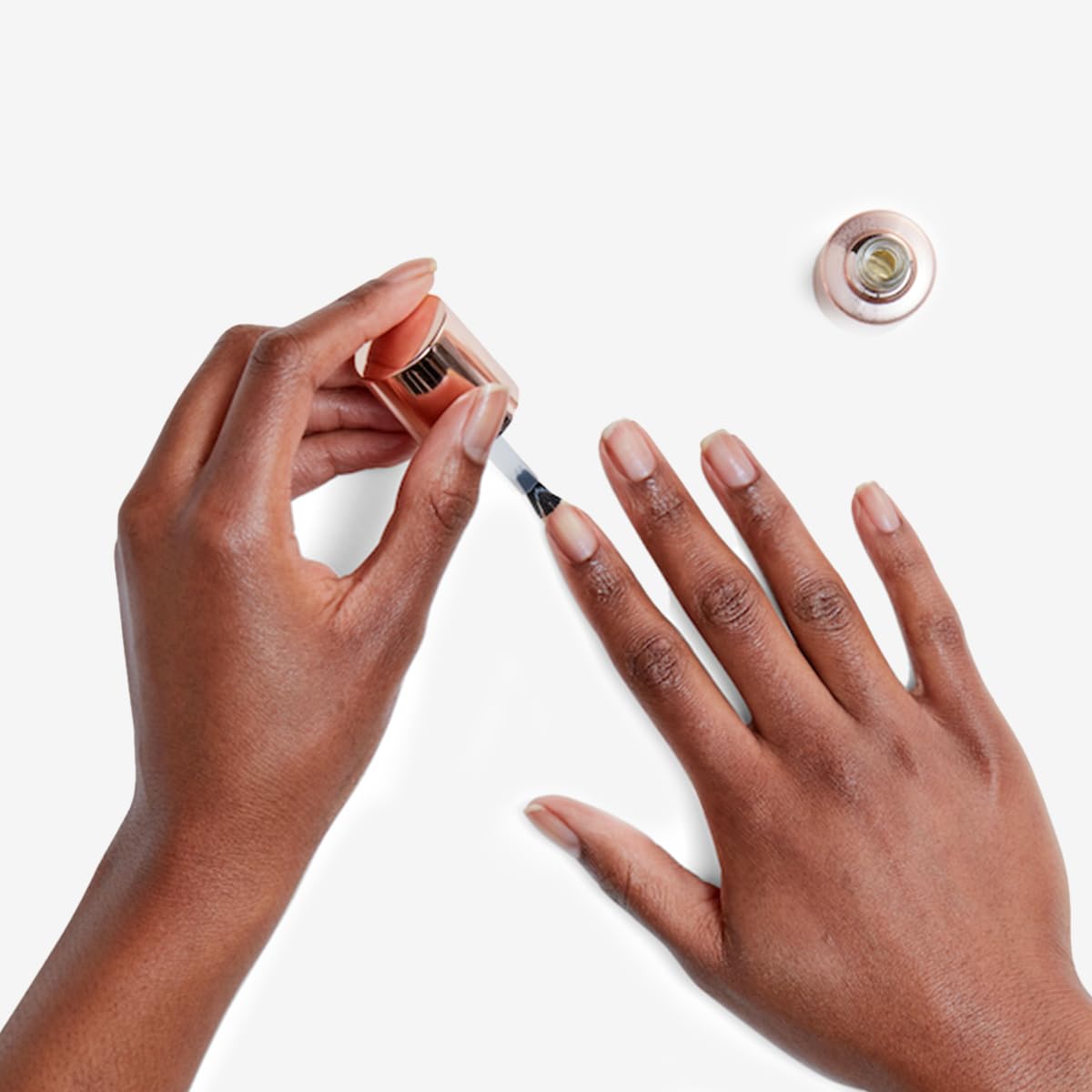 Olive & June clear nail prep formula bottle with cap off