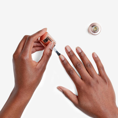 Olive & June clear nail prep formula bottle with cap off