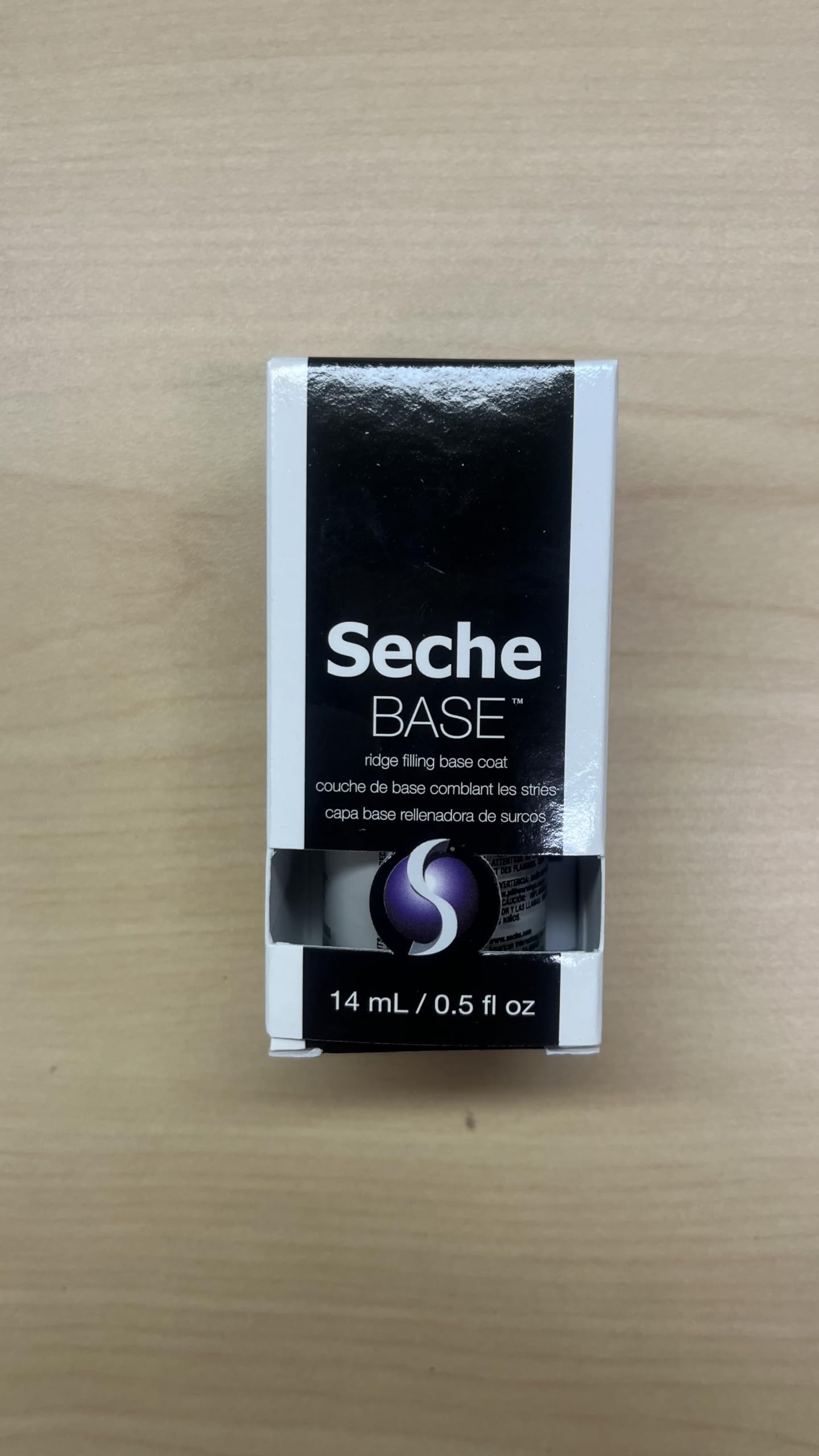 Seche clear base coat fluid ounce size showing transparent protective solution