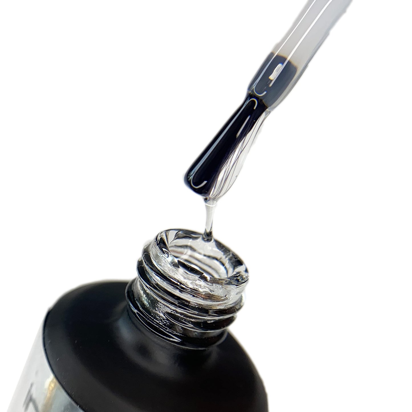 Thick self leveling texture of IN.HYPE strong base coat nail primer being applied with brush.