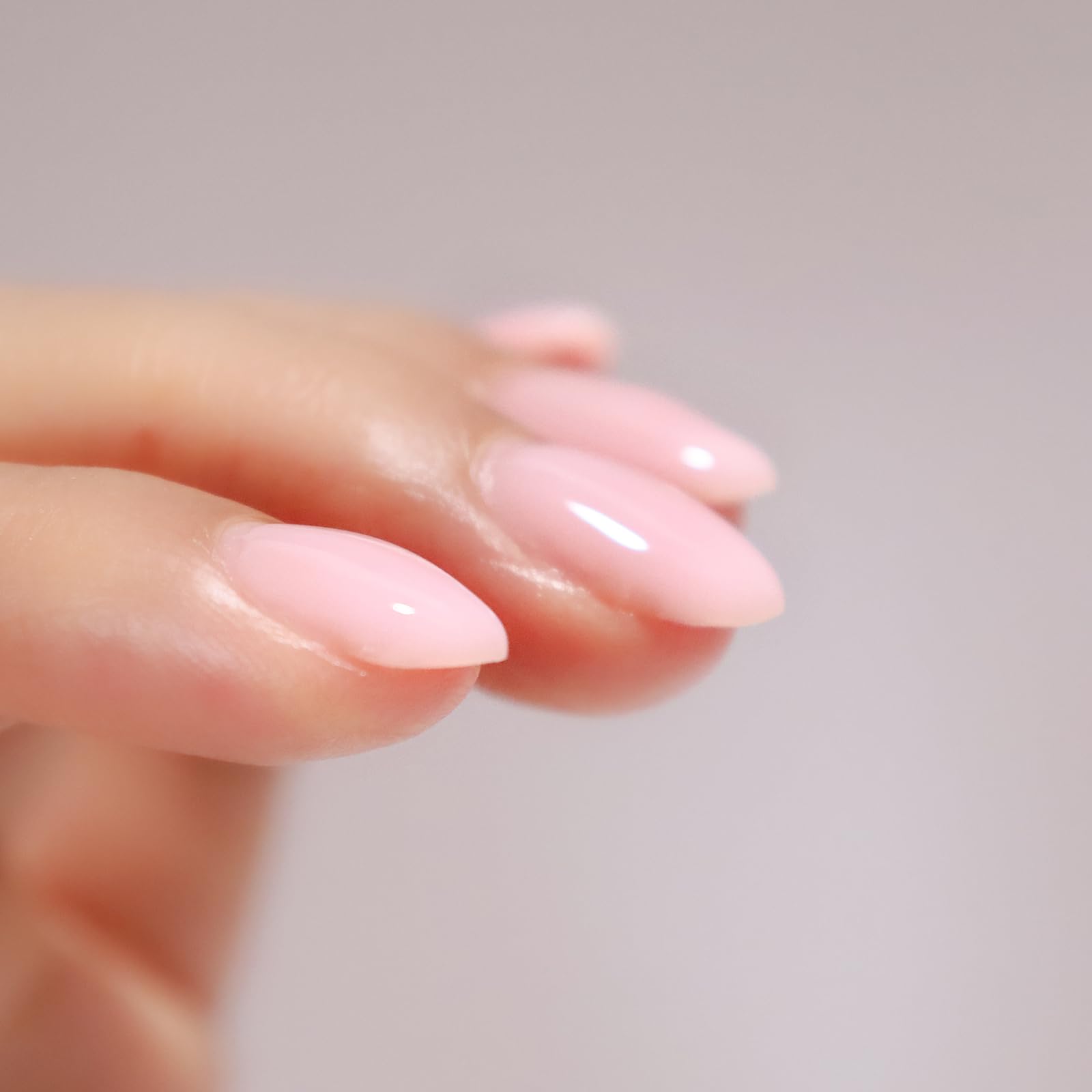Close-up view of the premium nail strengthener brush application showing no cuticle flooding or spilling.