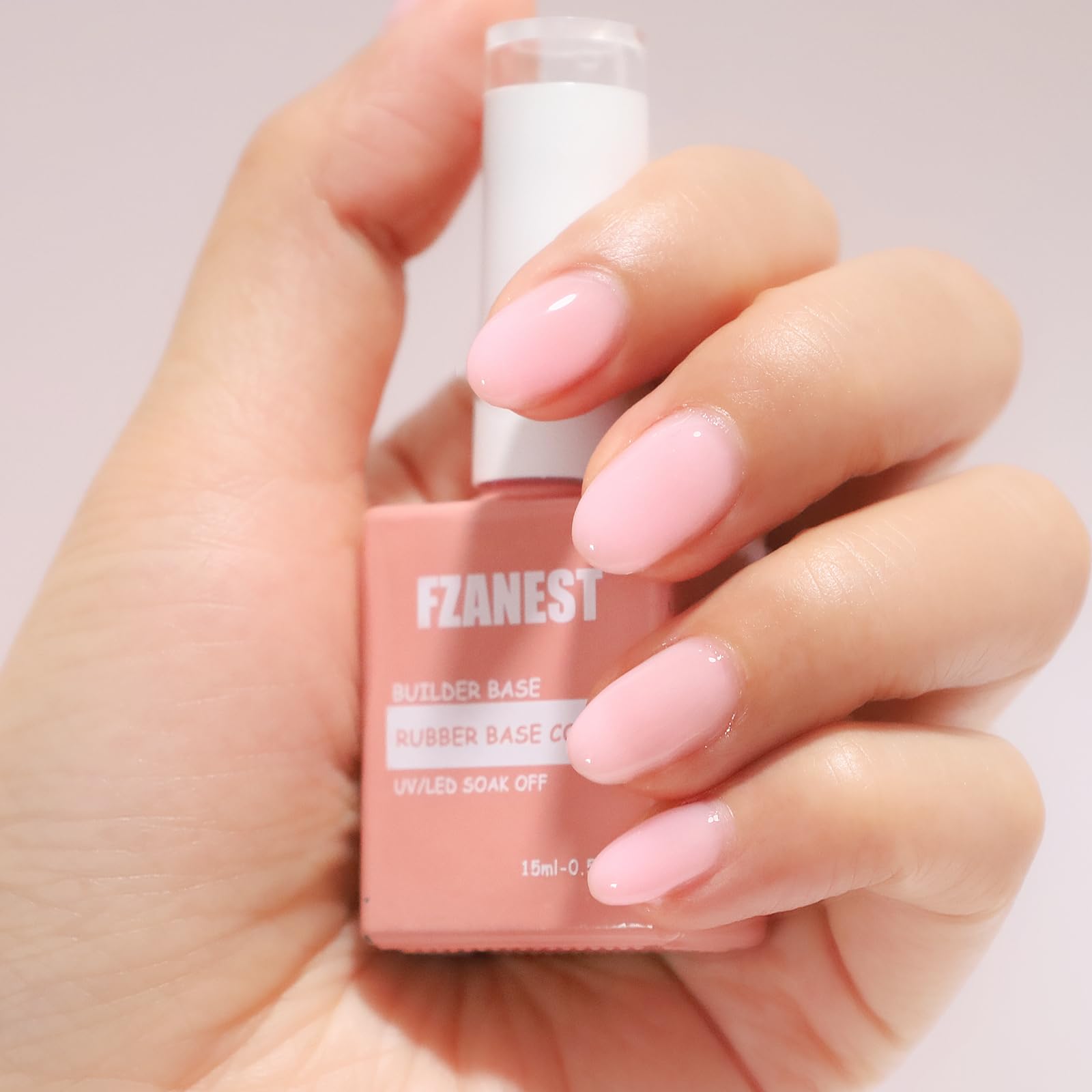 Side-angle view of a short nail extension created using the self-leveling FZANEST builder gel in a bottle.