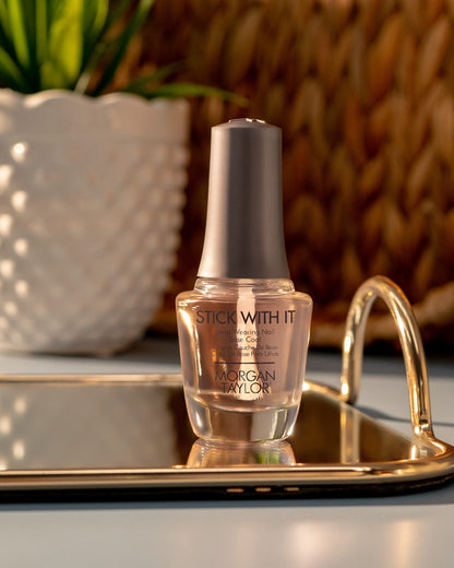 Morgan Taylor professional long lasting nail polish base coat showing ergonomic cap and clear bottle packaging