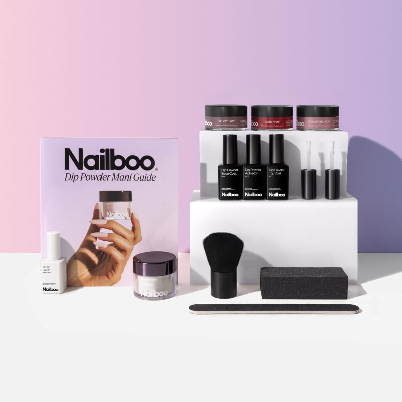 Nailboo Dip Powder liquid bottles including base activator and top coat arranged neatly.