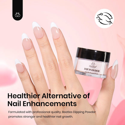 Model showing nude pink manicure using Beetles dip powder