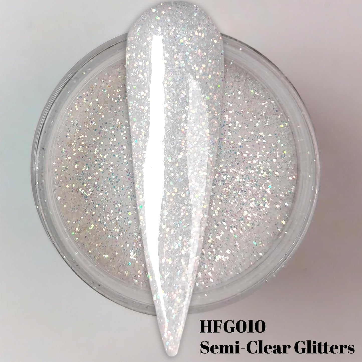 Close up of Oumisaya glow in the dark nail powder glitter texture