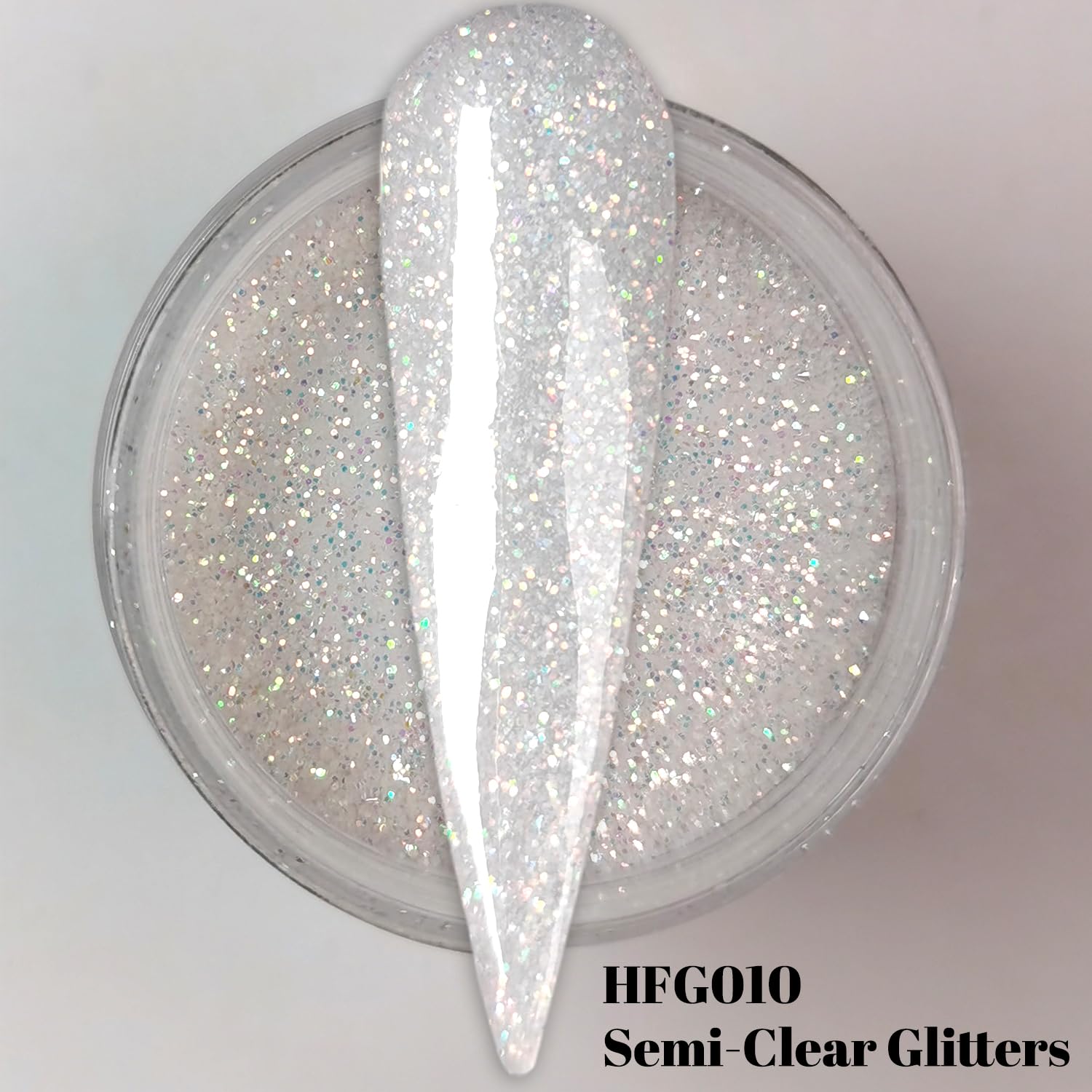 Close up of Oumisaya glow in the dark nail powder glitter texture